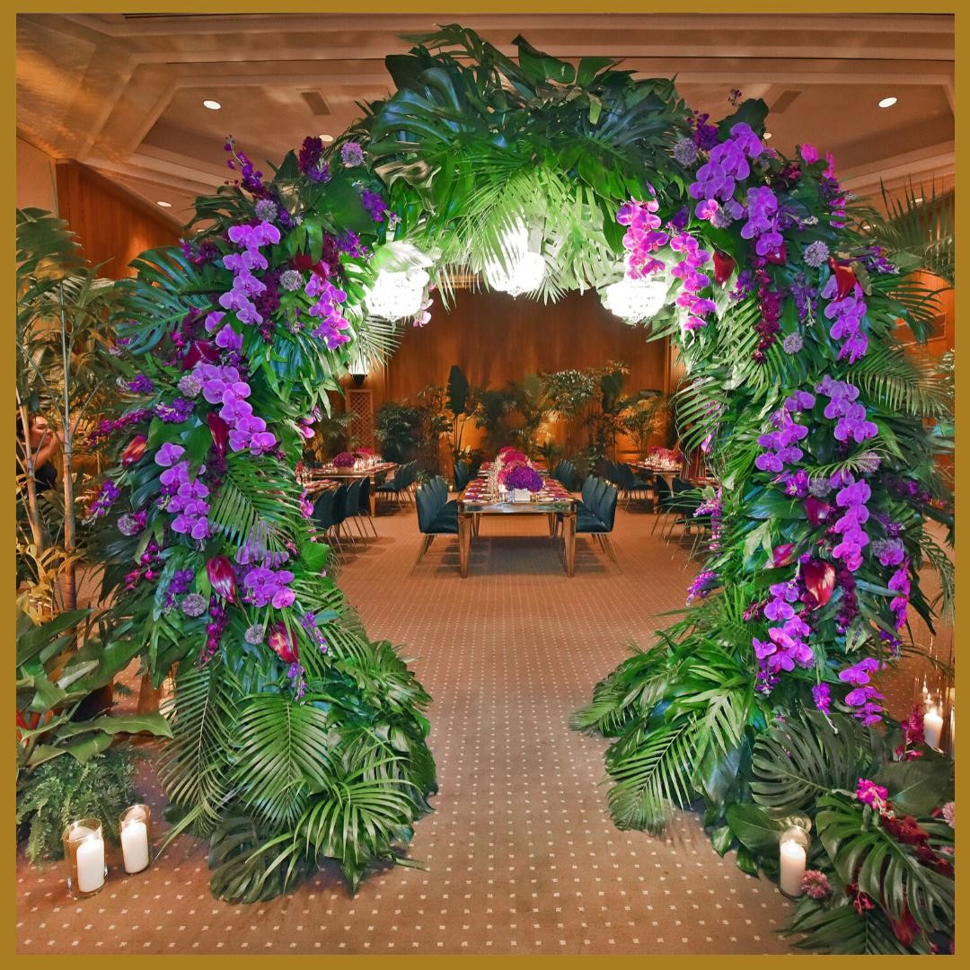 Bringing the outside indoors with an orchid-adorned archway to set the mood. Check those worries at the archway and get ready for the time of your life.